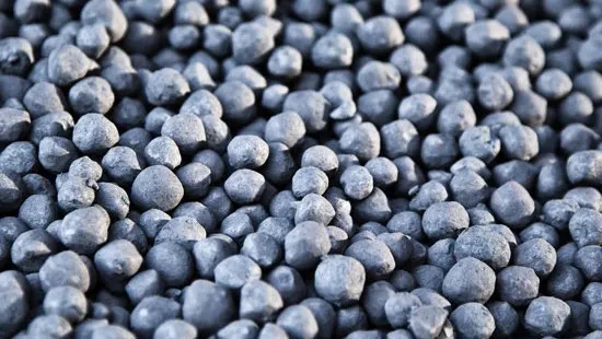 Close-up of iron ore pellets produced at SAL Steel